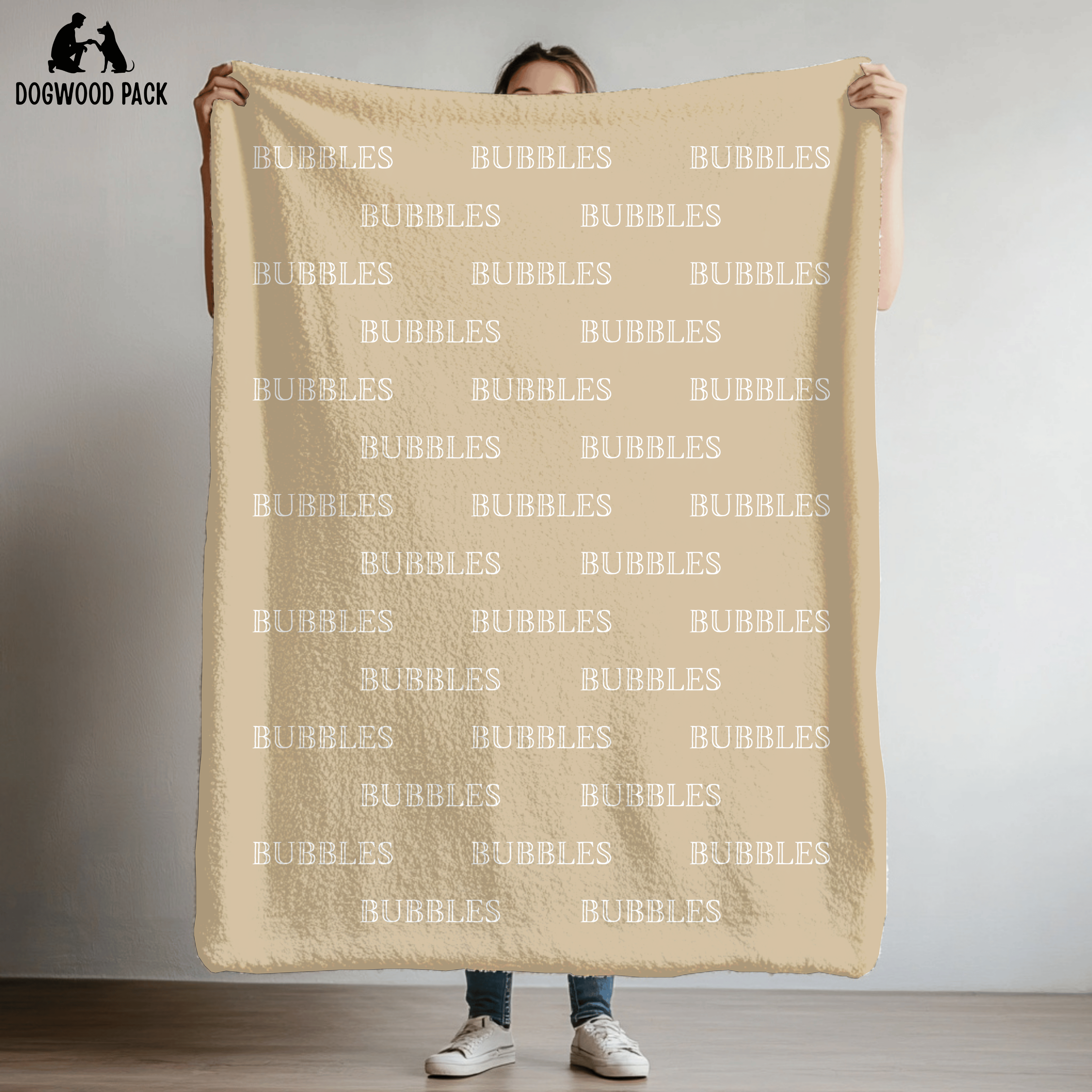 custom dog blanket that is personalized with bubble name in plush and sherpa fabric on tan background