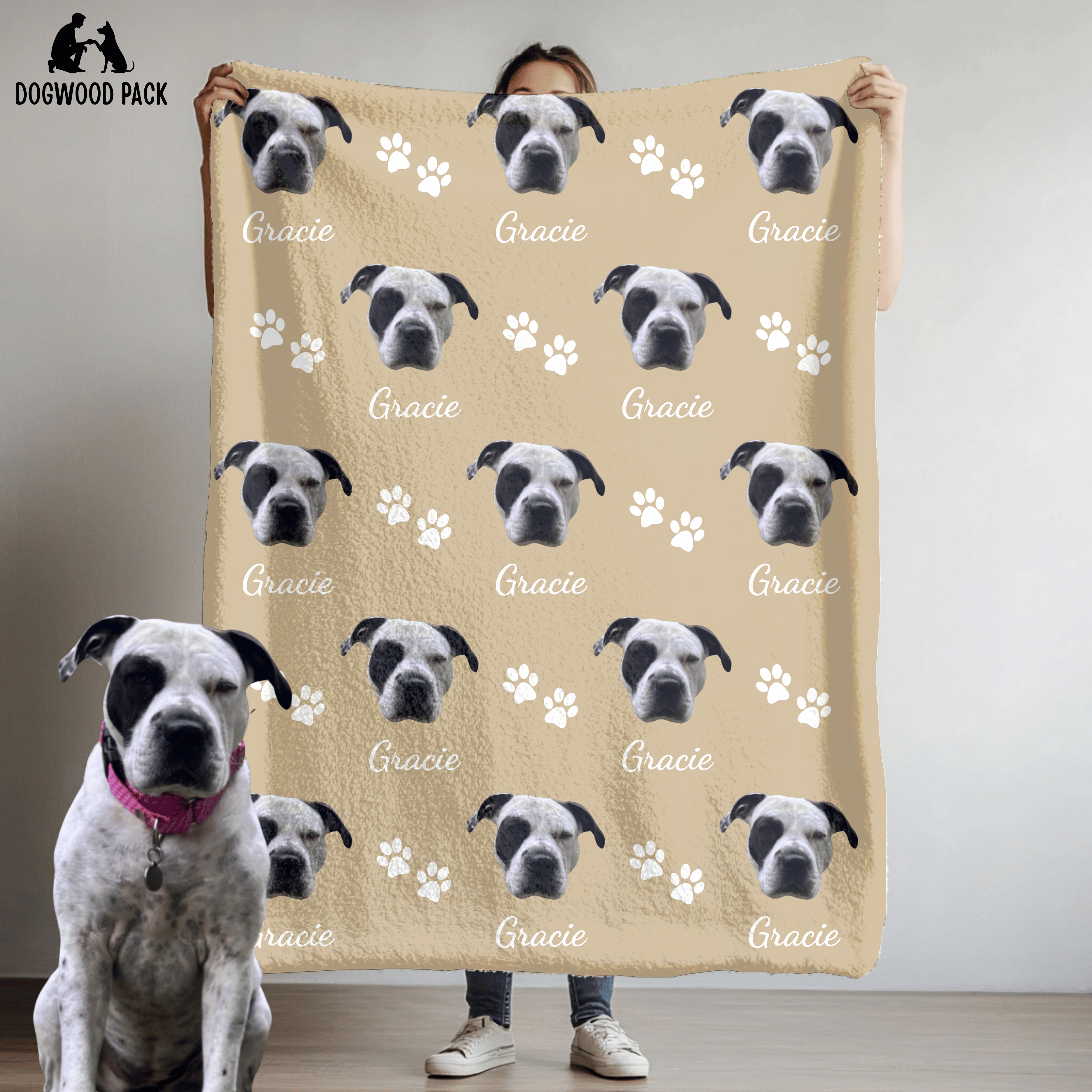 custom dog blanket with face and name with a paw-print design on a tan background