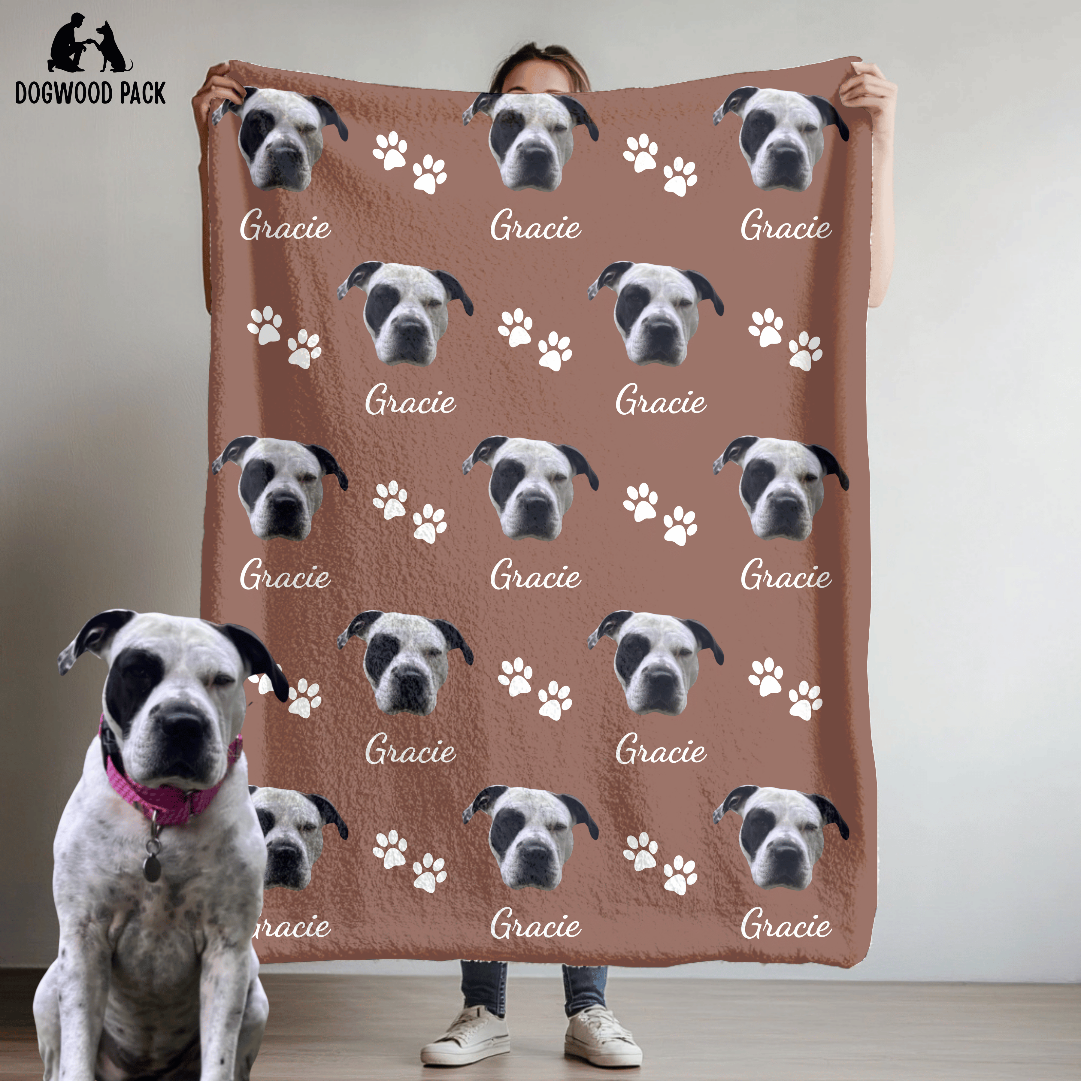 custom dog blanket with face and name with a paw-print design on a red background