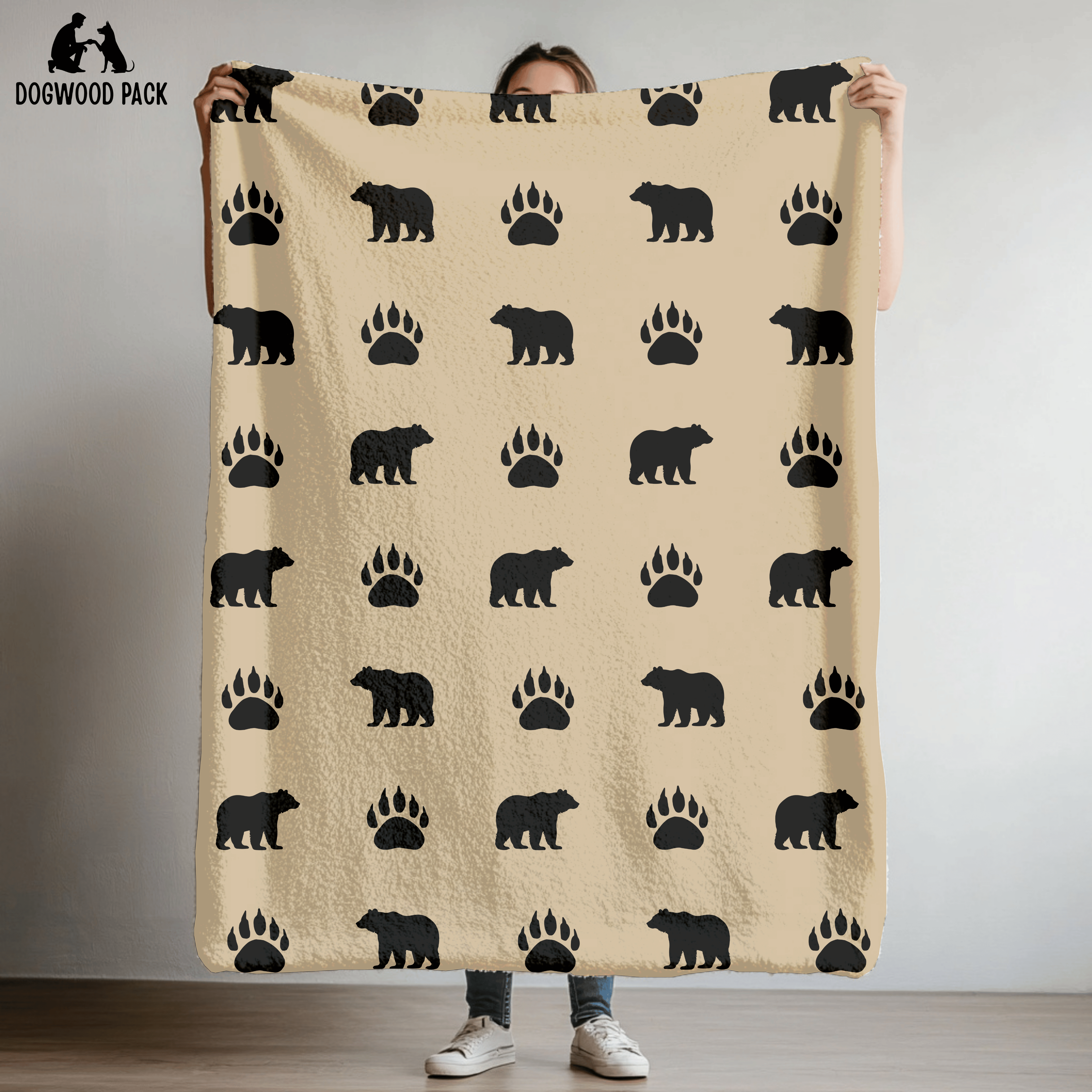 dog blanket with bear paw design on a tan background in plush and sherpa fabrics