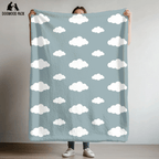 dog blanket with cloud design on a blue background in plush and sherpa fabrics