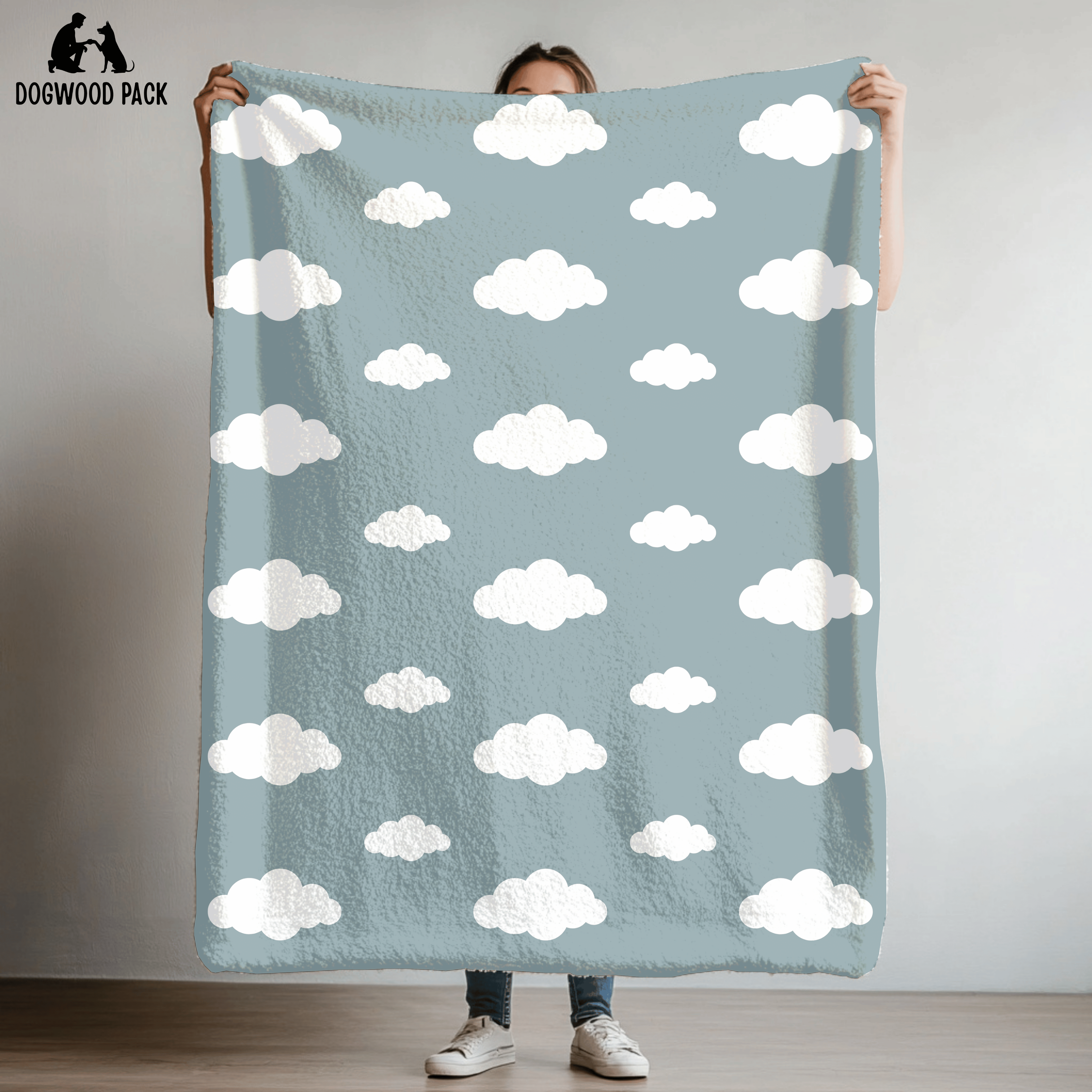dog blanket with cloud design on a blue background in plush and sherpa fabrics