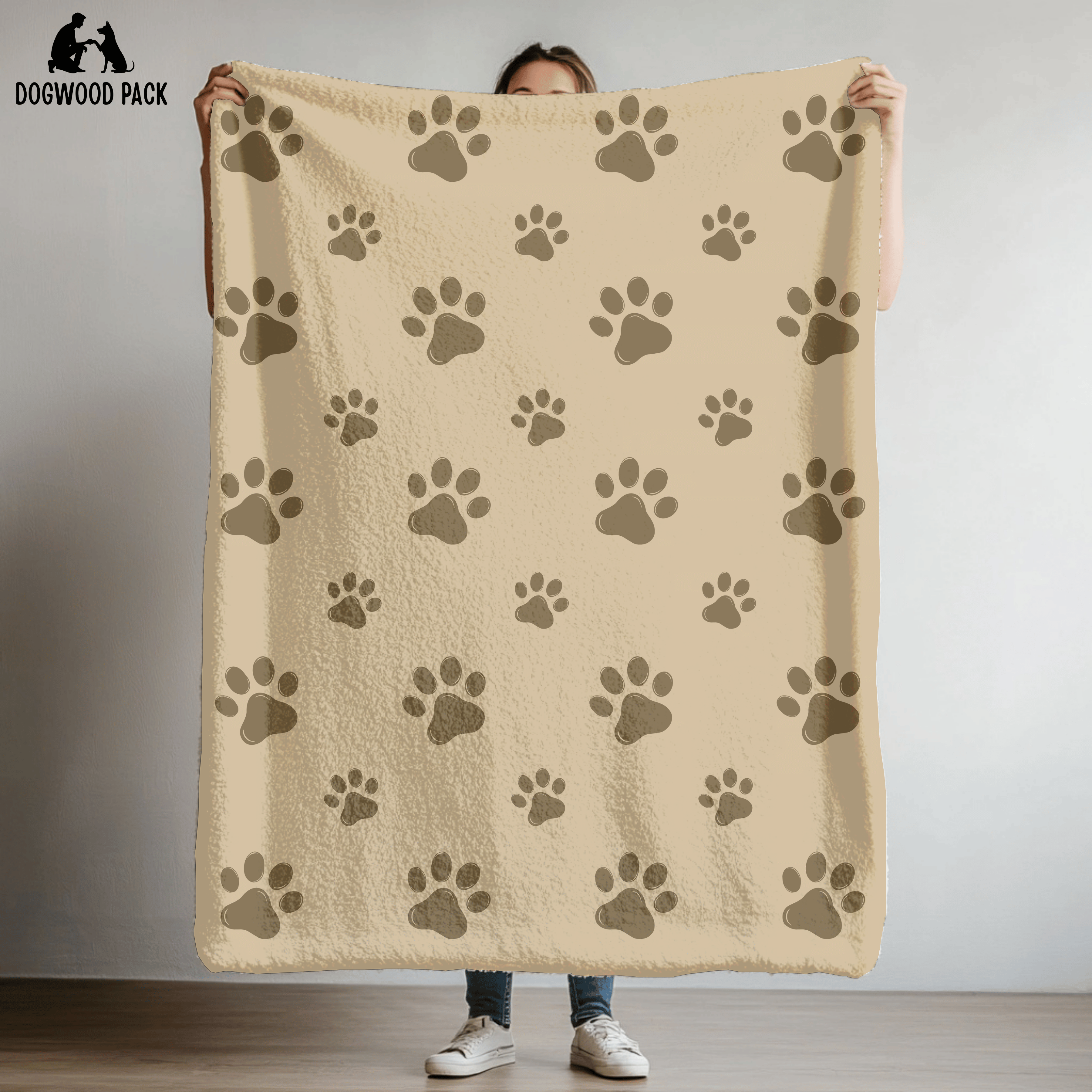 dog blanket with paw print design on a tan background in plush and sherpa fabrics